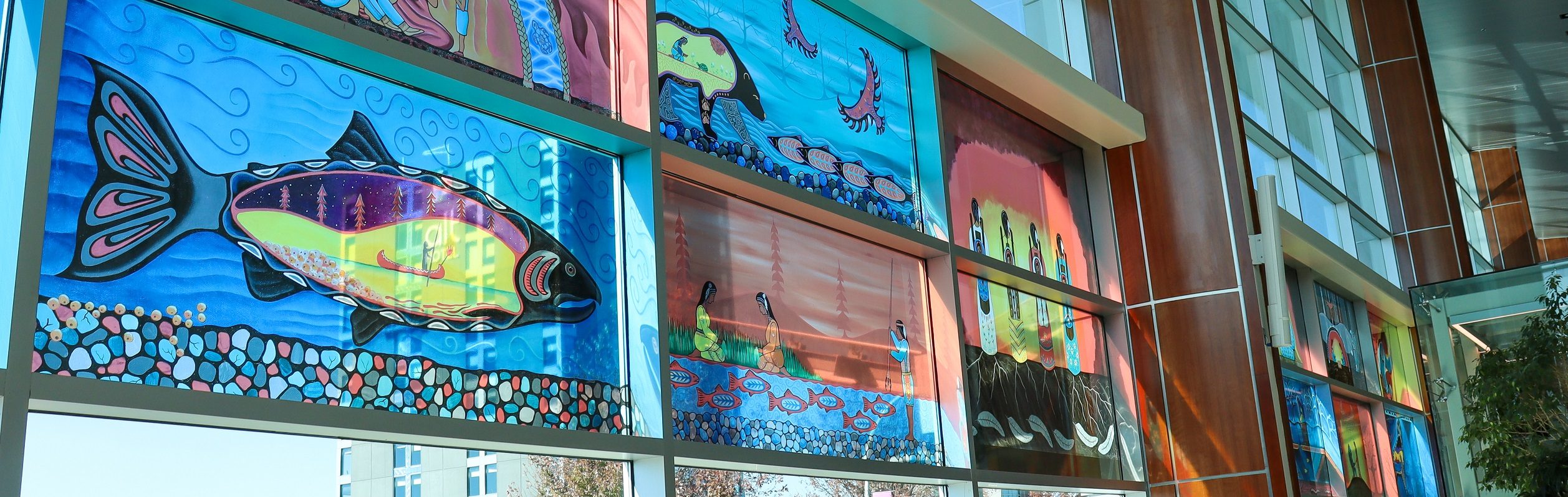 A photo of artwork adorning the windows of the airport